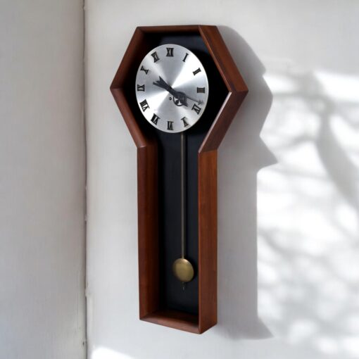 Howard Miller model 557 clock designed by Arthur Umanoff
