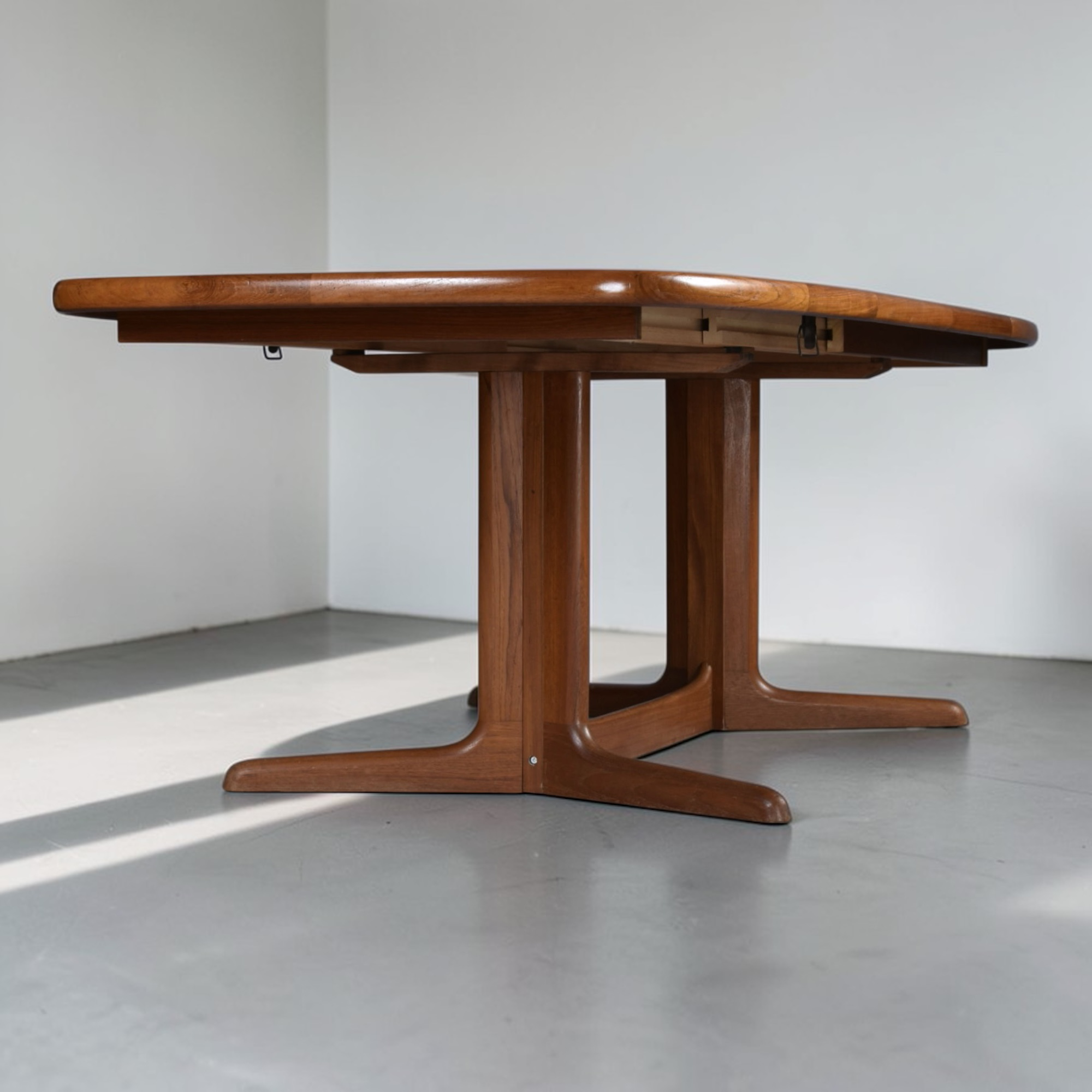 Rasmus oval Danish teak dining table with pedestal base