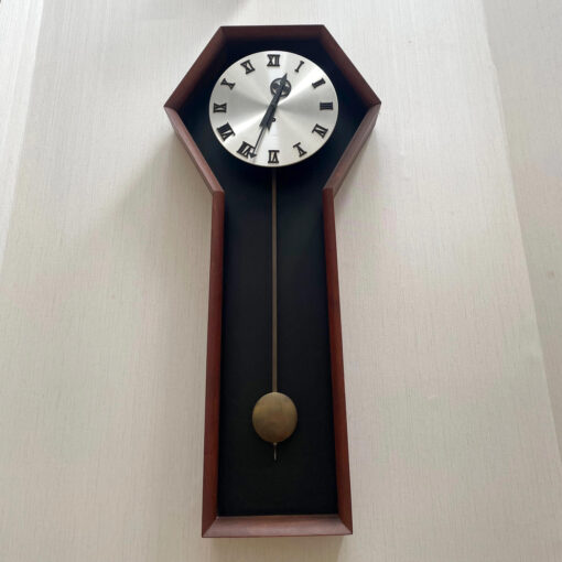 Howard Miller model 557 clock designed by Arthur Umanoff