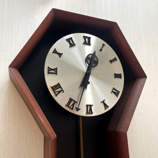 Howard Miller model 557 clock designed by Arthur Umanoff