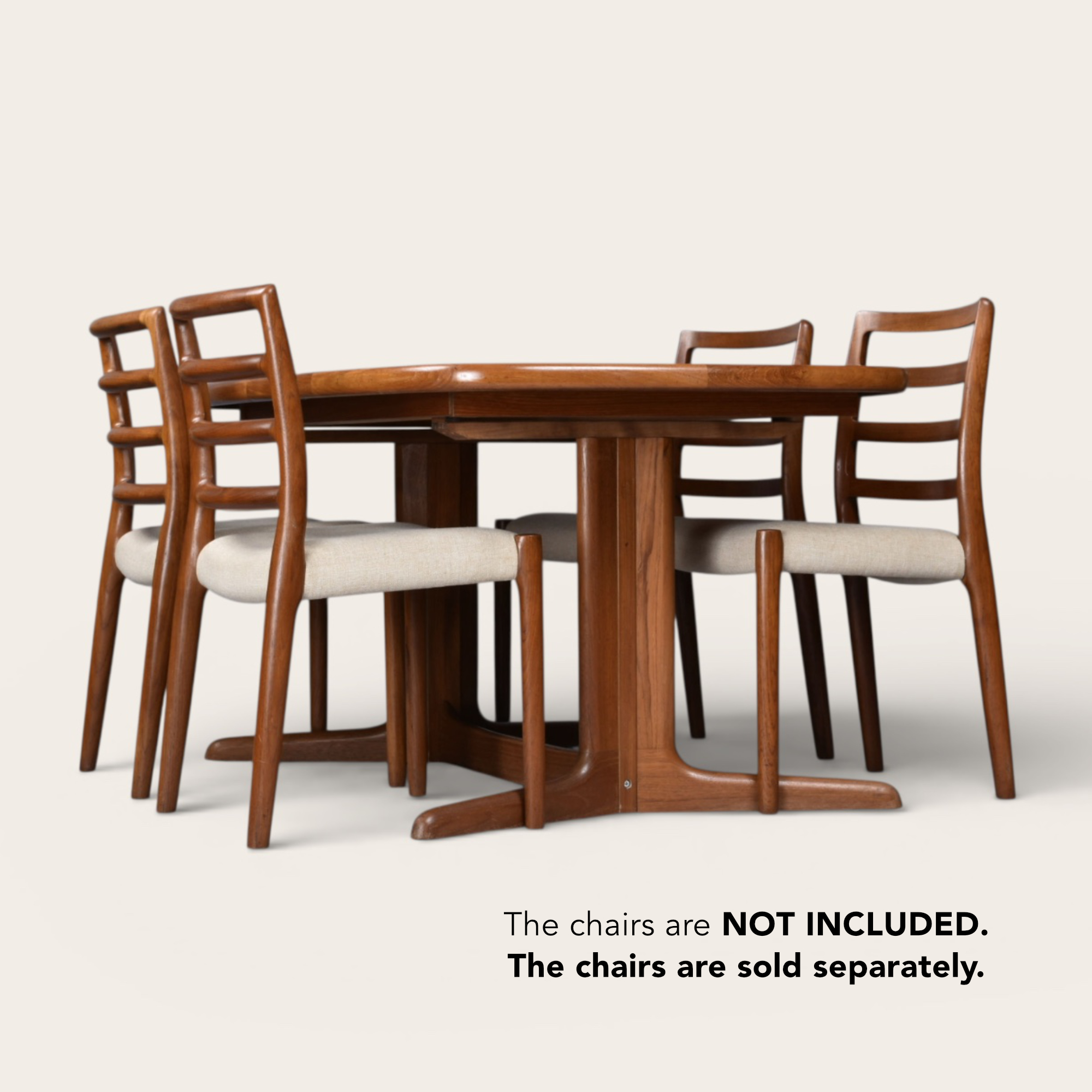 Rasmus oval Danish teak dining table with pedestal base