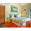 Yellow retro nightstands in bedroom