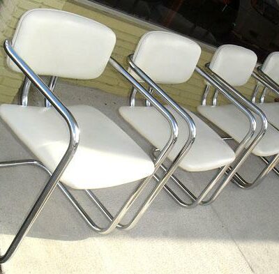 4 Retro White Vinyl and Chrome Chairs