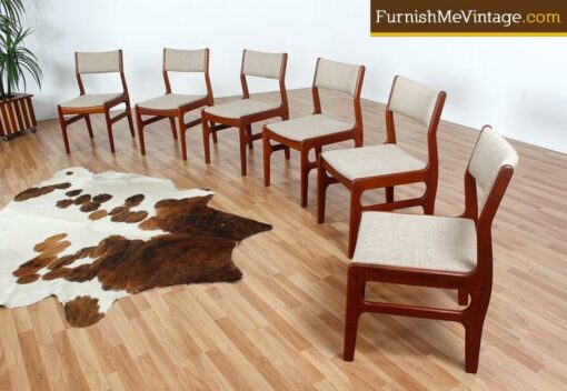 Set of six mid century modern Danish teak chairs in new upholstery