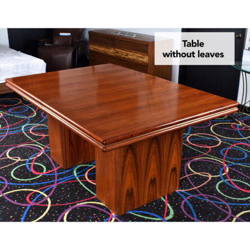 Sanneman Danish Modern rosewood dining table with leaf