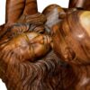 Sensual lovers monkeypod wood carved coffee table with glass top