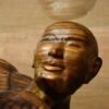 Sensual lovers monkeypod wood carved coffee table with glass top