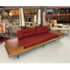 red pearsall daybed sofa with end tables