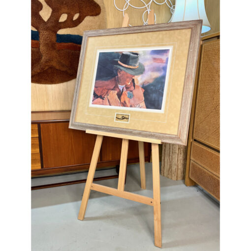 Western rancher portrait with barbwire in frame