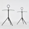 Minimalist round glass and steel side tables with tripod bases