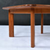 Wedge shaped legs on Danish Modern solid teak coffee table