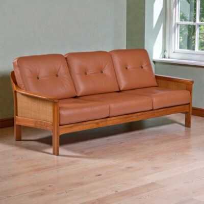 Teak and leather sofa with caned accents