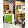 White wicker hanging scoop chair mounted from the ceiling