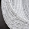 Close up on freshly painted white wicker