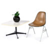 Charles Eames for Herman Miller brown Naugahyde stackable chair with white side table