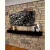 Finesse Originals Fisherman wall sculpture mounted to stone wall