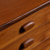Solid teak sculpted pulls on Mid-Century Modern English credenza