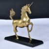 Galloping large brass unicorn sculpture