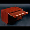 Pull out shelf on rosewood nightstand by Moser