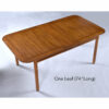 Mid-Century Modern dining table shown with one leaf