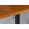 Adjustable height table scratch edge
