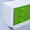 Side view of green Space Age Broyhill Chapter One triple dresser