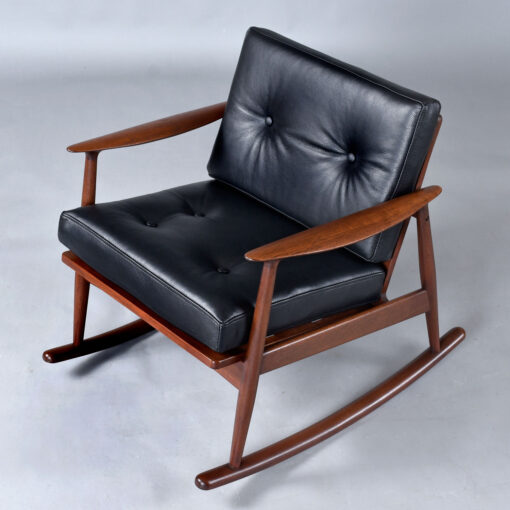 Pair of MM Moreddi Danish teak rocking chairs in new black leather