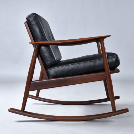 Pair of MM Moreddi Danish teak rocking chairs in new black leather