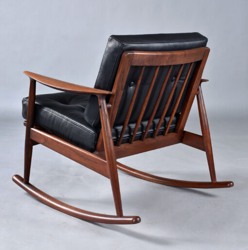 Pair of MM Moreddi Danish teak rocking chairs in new black leather