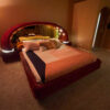 Verardo Italian 1970s suede platfrom bed with mirrored headboard and built in nightstands and stereo with phone