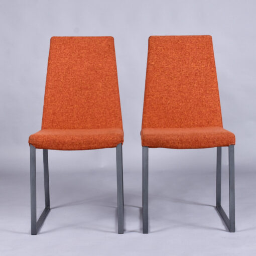Trica Curvo orange upholstered modern dining chairs from Quebec