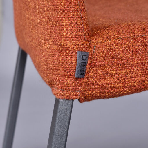 Trica Curvo orange upholstered modern dining chairs from Quebec