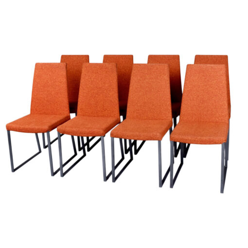 Trica Curvo orange upholstered modern dining chairs from Quebec