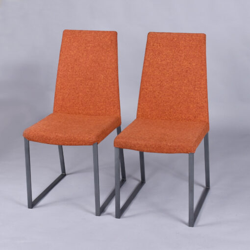 Trica Curvo orange upholstered modern dining chairs from Quebec