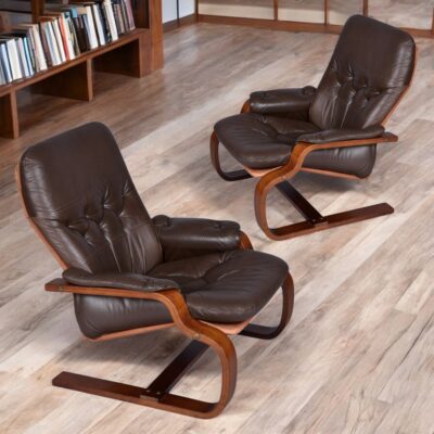 Brown leather cantilever Scandinavian sling chairs