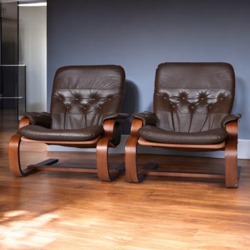 Brown leather cantilever Scandinavian sling chairs