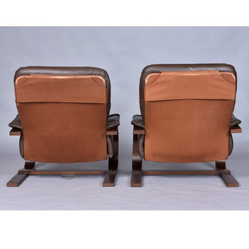 Brown leather cantilever Scandinavian sling chairs