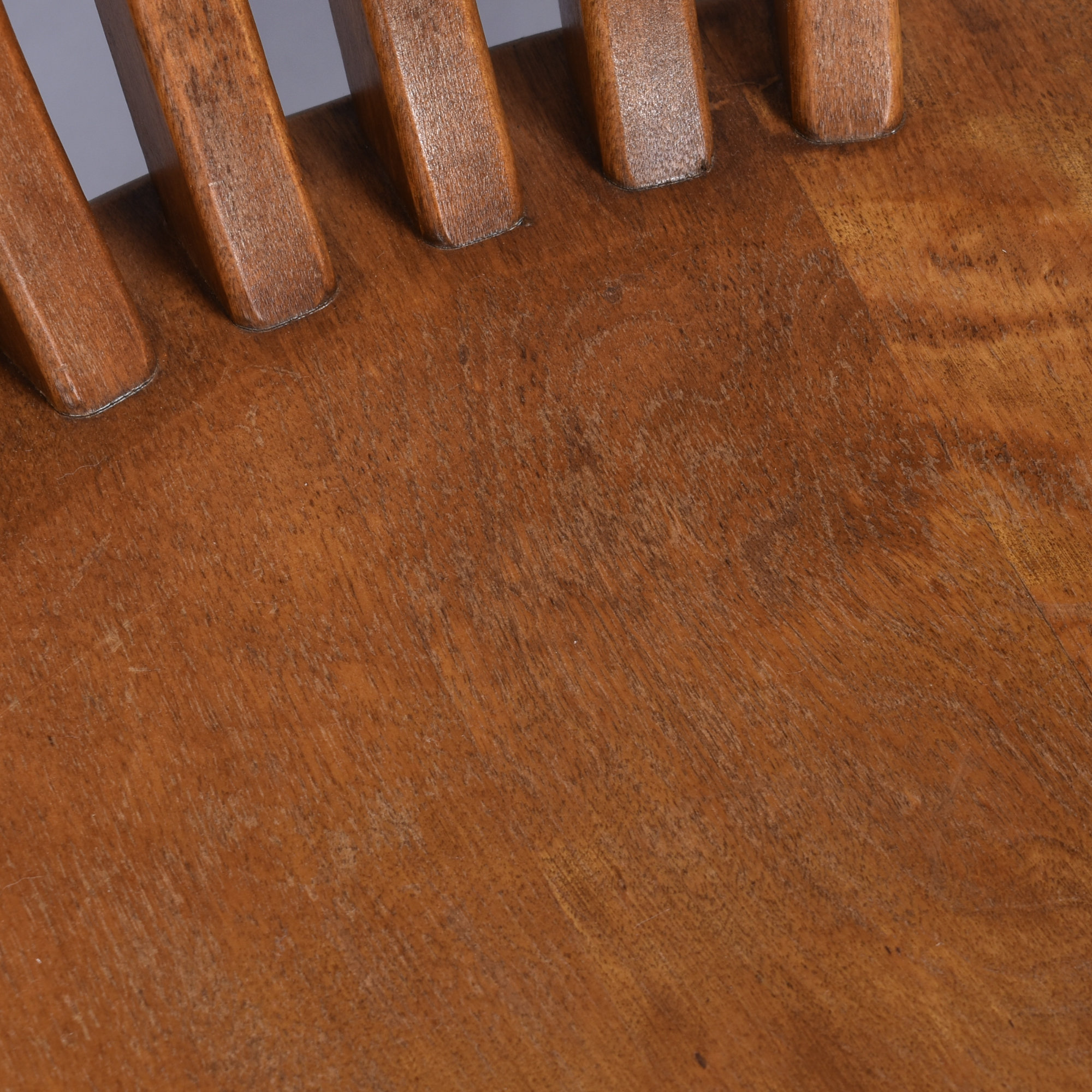 Wear on solid wood vintage bankers or library chairs