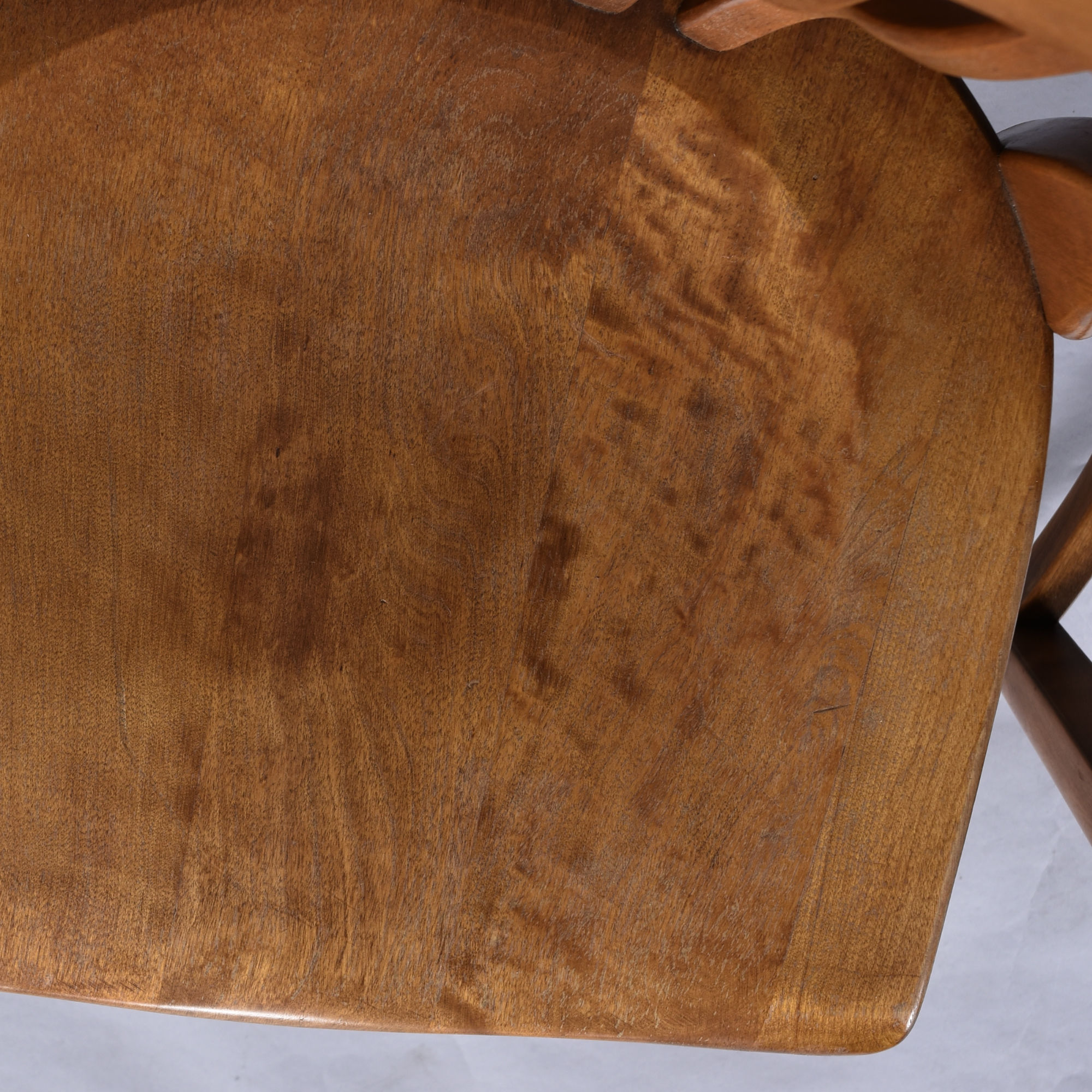 Wear on solid wood vintage bankers or library chairs