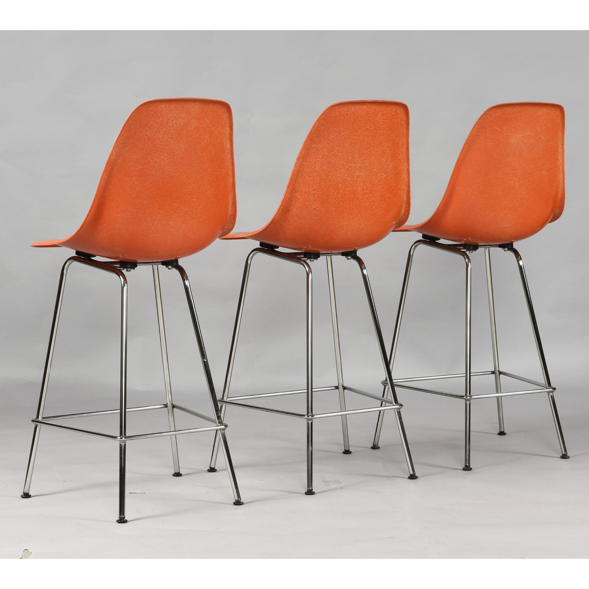 Eames for Herman Miller fiberglass shell counter height bar stools